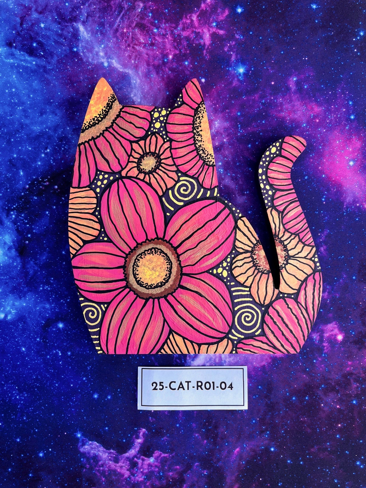 Hand Painted Item Sitting on Galaxy Background