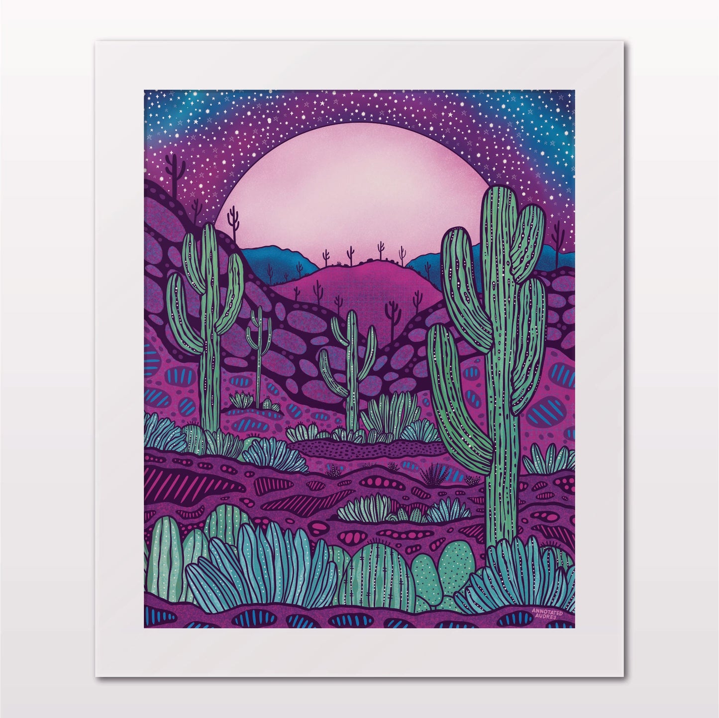 Art print in white frame on white wall