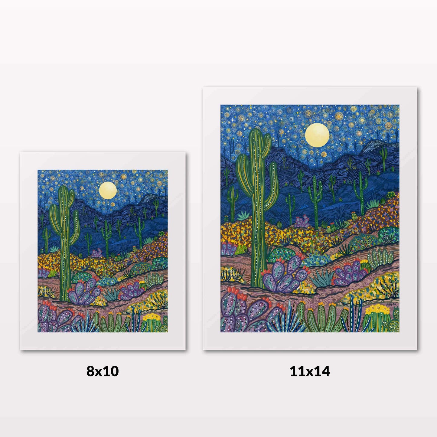 Comparing 8x10 and 11x14 framed art prints on a white wall