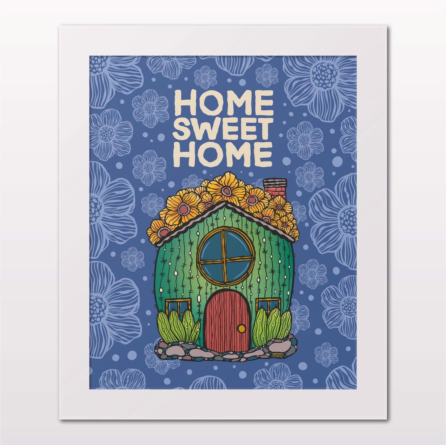 Art print in white frame on white wall