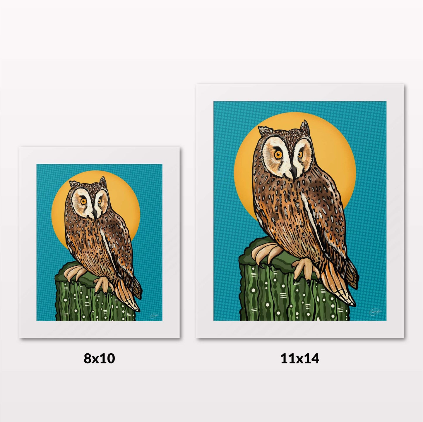 Comparing 8x10 and 11x14 framed art prints on a white wall