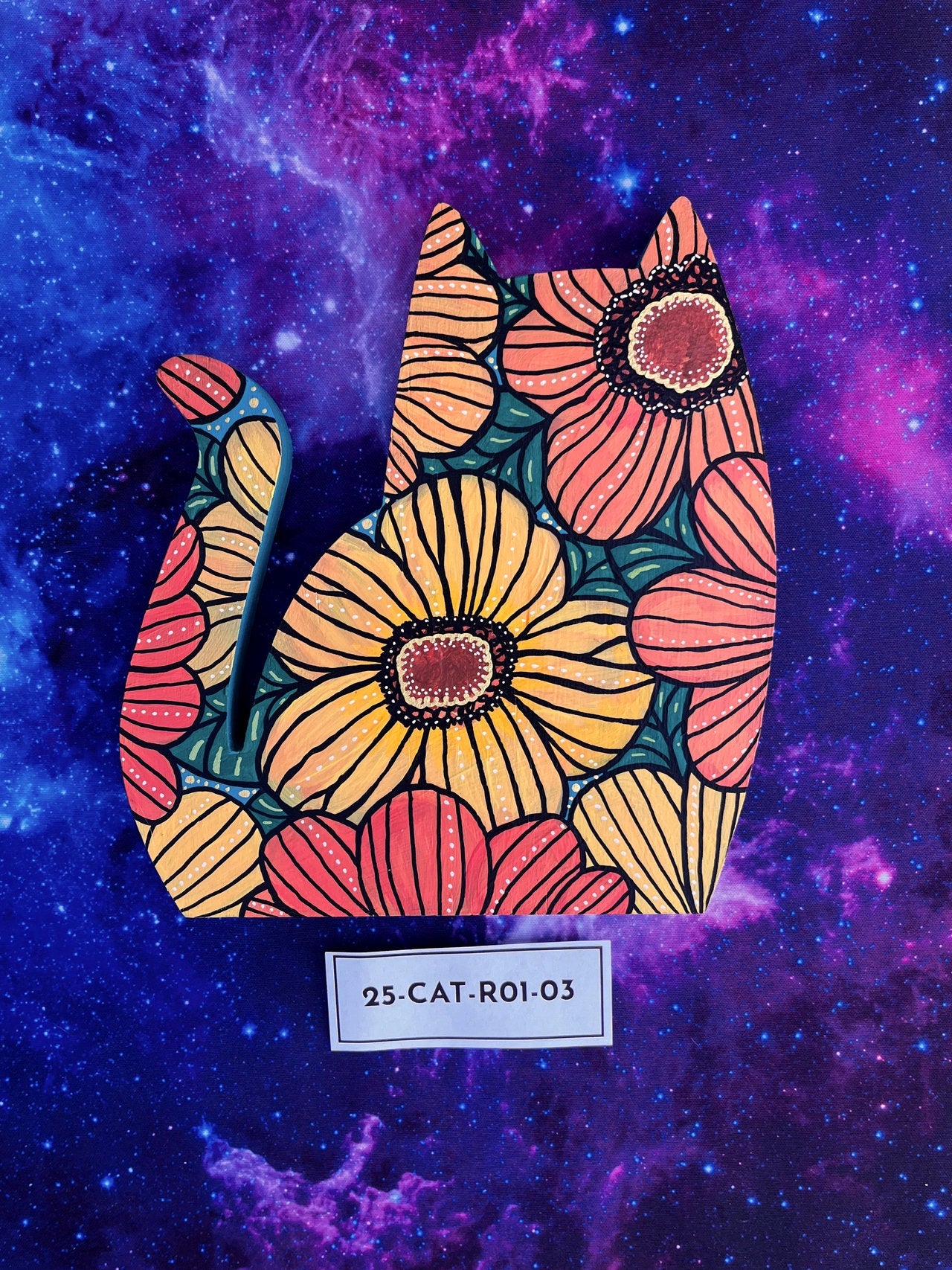 Hand Painted Item Sitting on Galaxy Background