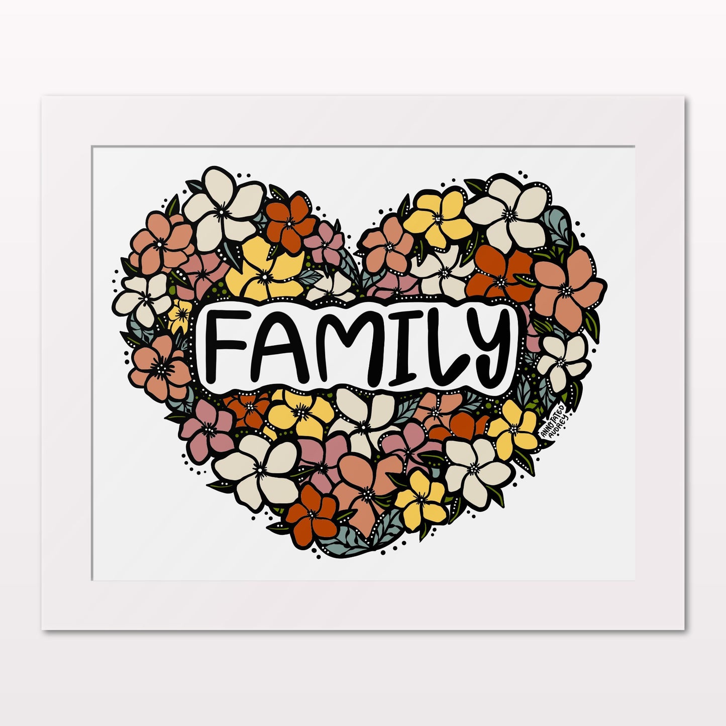 Art print in white frame on white wall