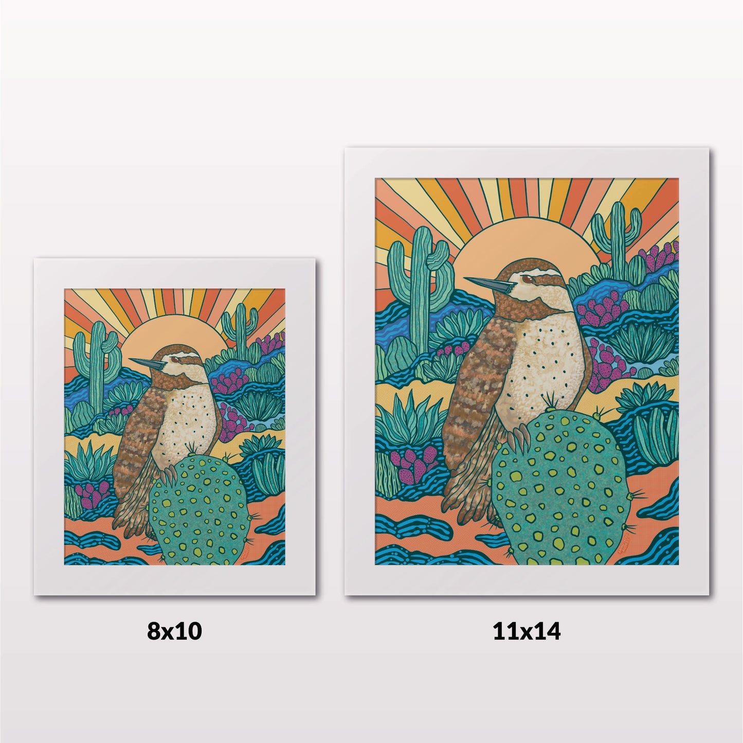Comparing 8x10 and 11x14 framed art prints on a white wall