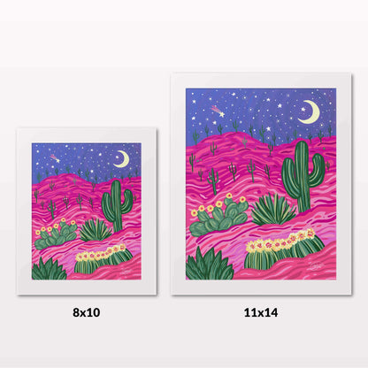 Comparing 8x10 and 11x14 framed art prints on a white wall