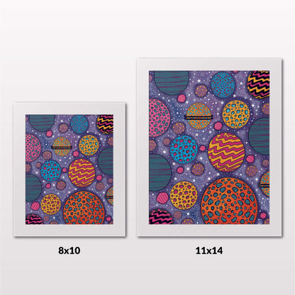 Comparing 8x10 and 11x14 framed art prints on a white wall