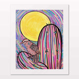 Art print in white frame on white wall