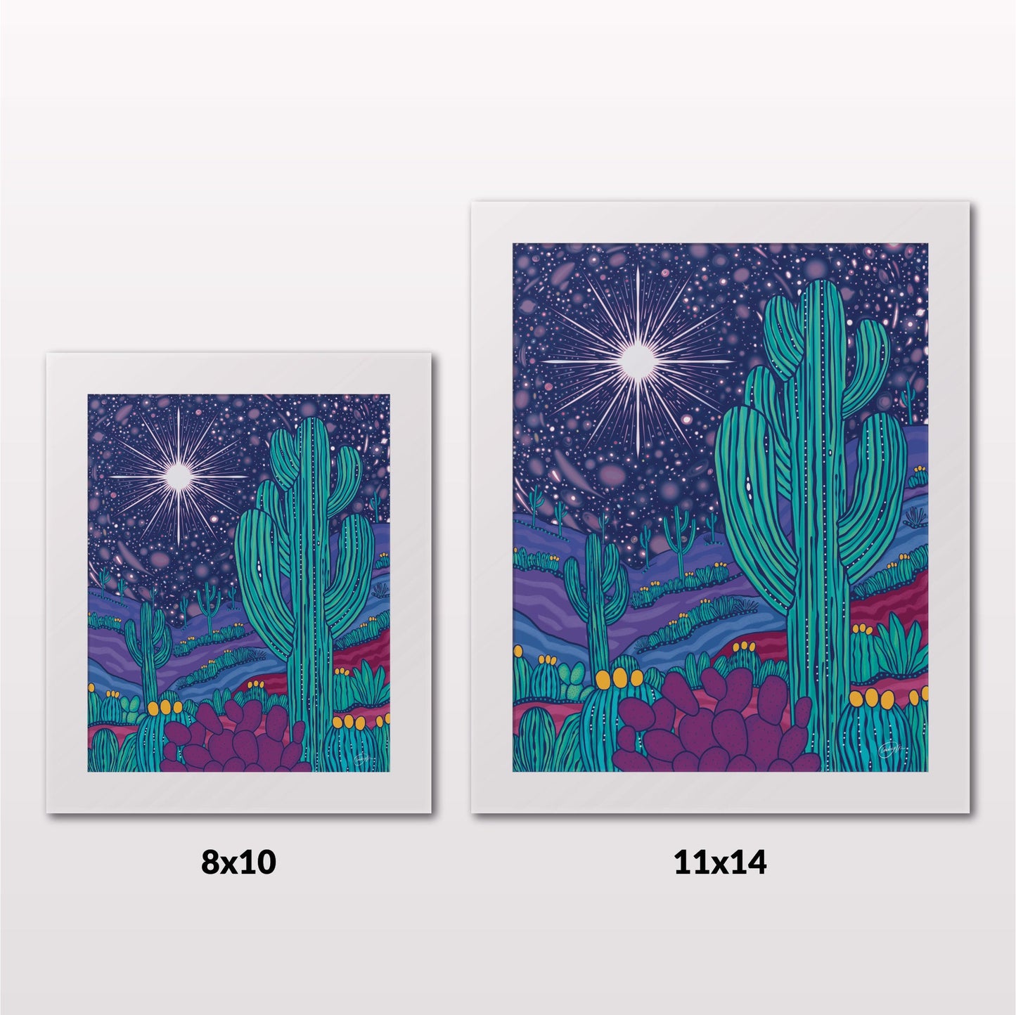 Comparing 8x10 and 11x14 framed art prints on a white wall
