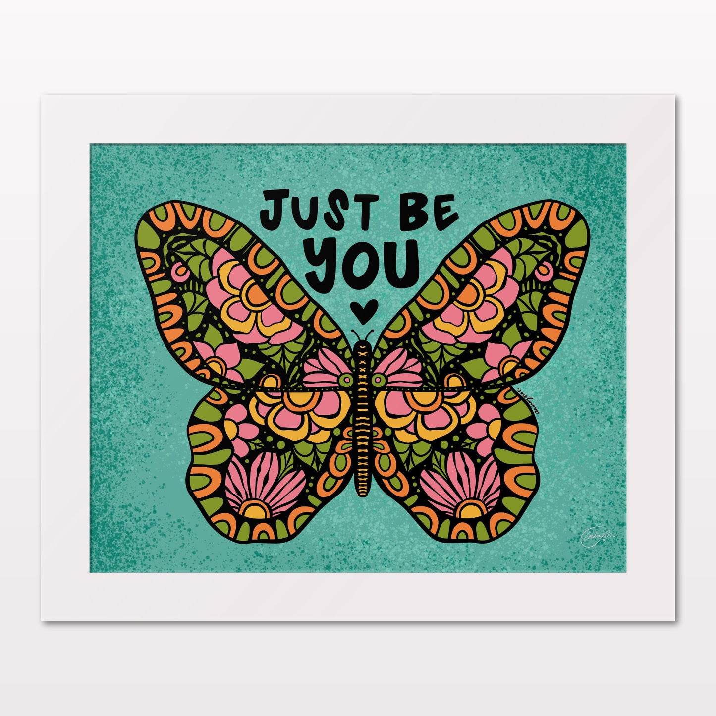 Art print in white frame on white wall