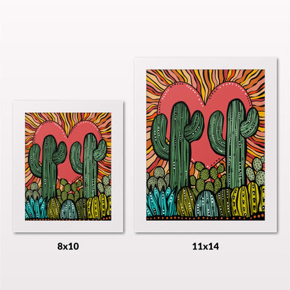 Comparing 8x10 and 11x14 framed art prints on a white wall