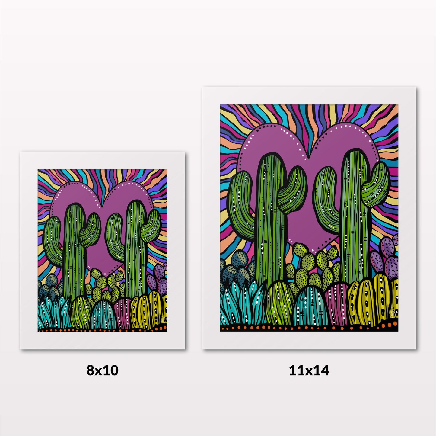 Comparing 8x10 and 11x14 framed art prints on a white wall