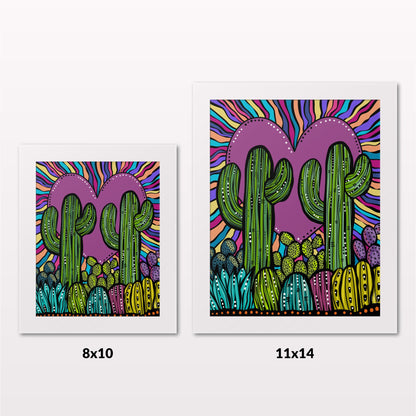 Comparing 8x10 and 11x14 framed art prints on a white wall