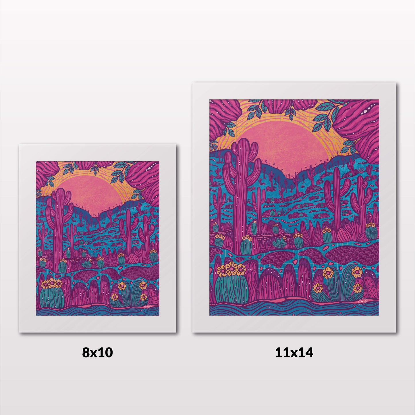 Comparing 8x10 and 11x14 framed art prints on a white wall