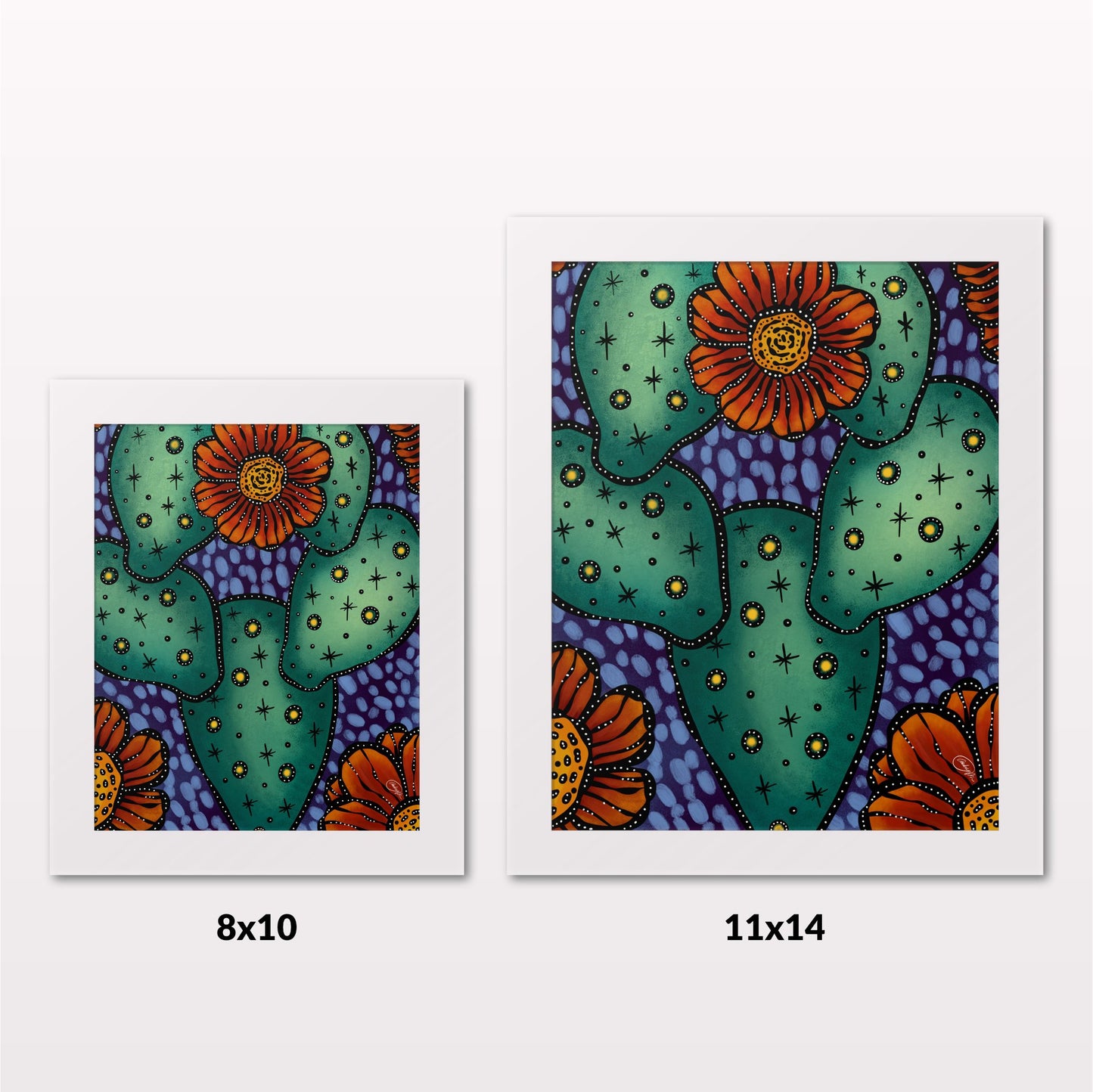 Comparing 8x10 and 11x14 framed art prints on a white wall