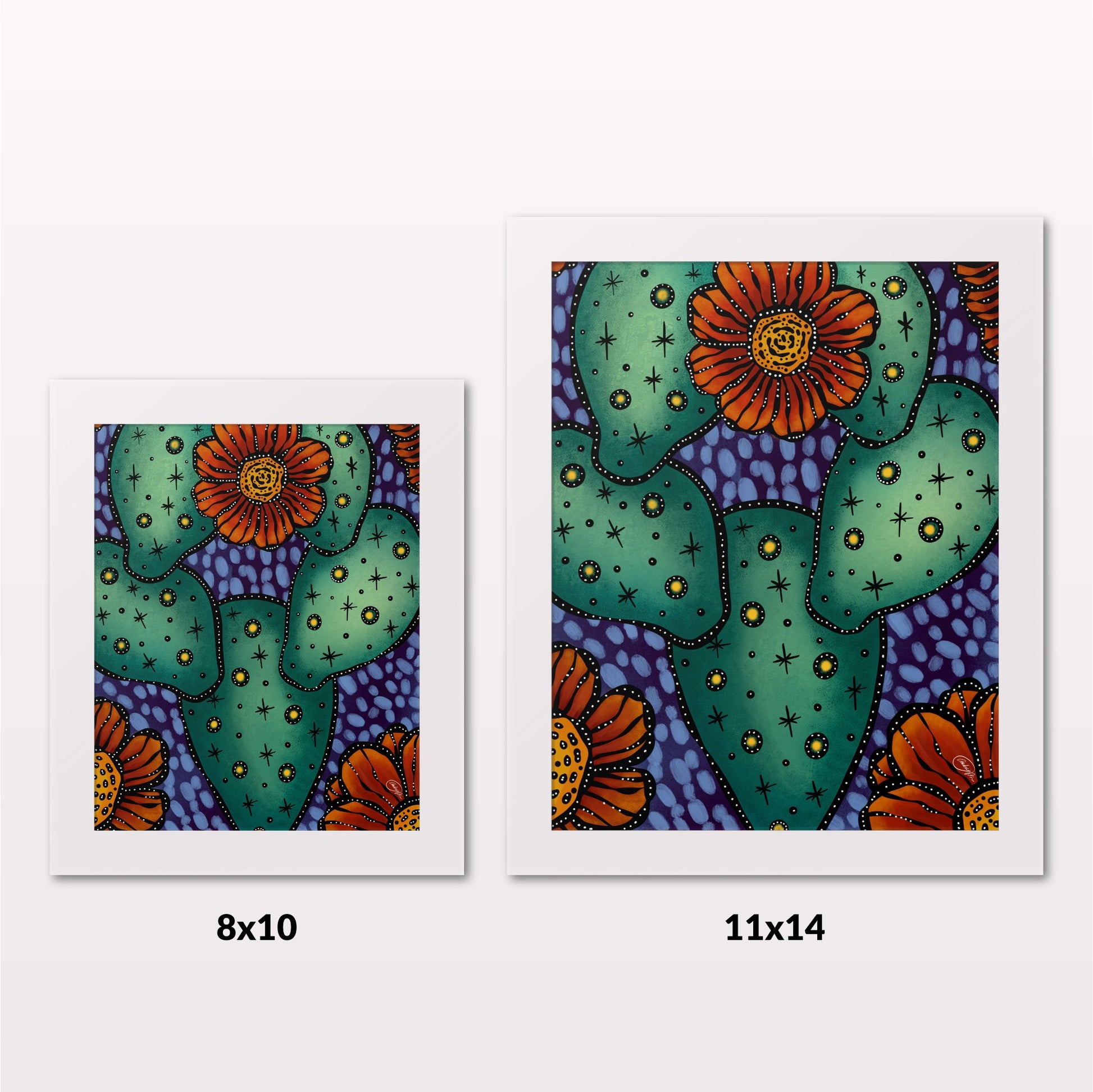Comparing 8x10 and 11x14 framed art prints on a white wall