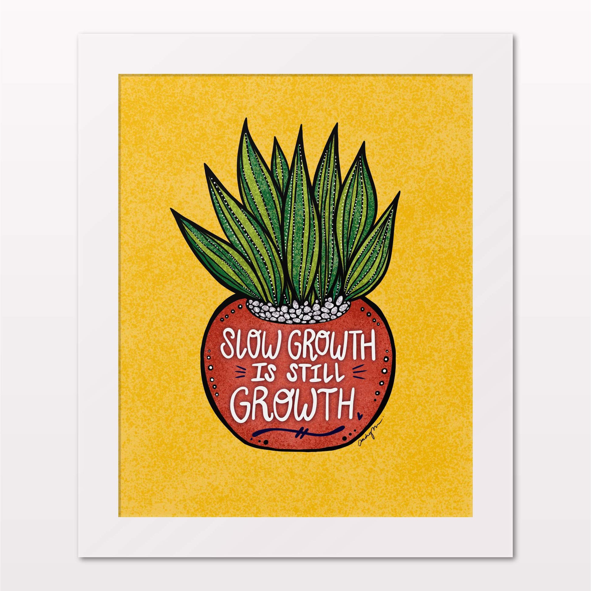 Art print in white frame on white wall