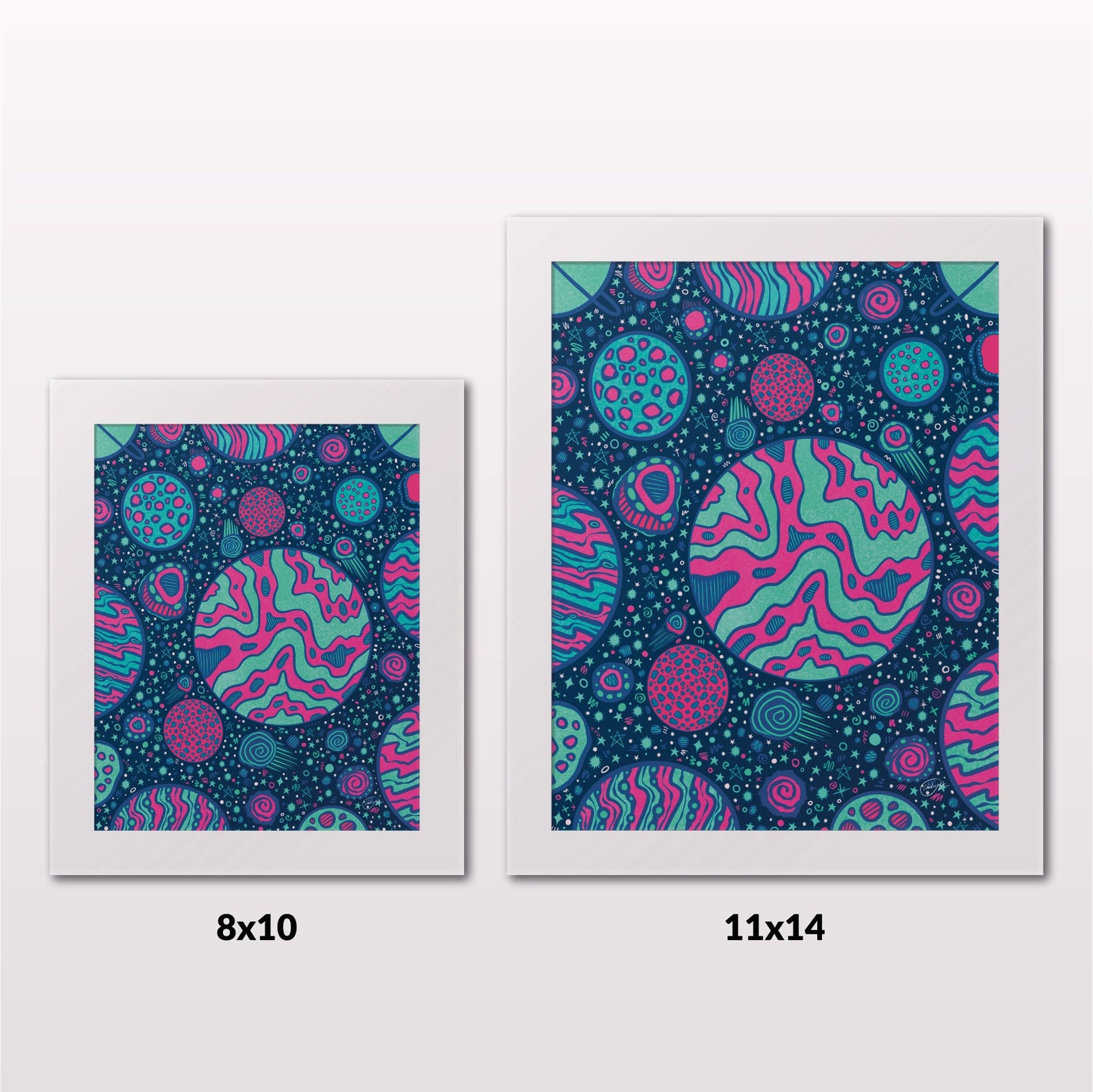 Comparing 8x10 and 11x14 framed art prints on a white wall