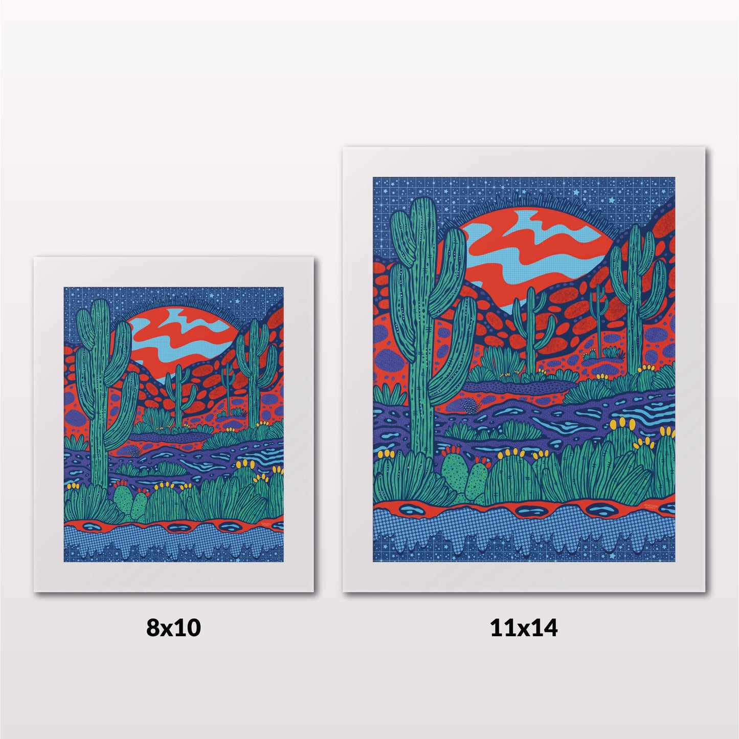 Comparing 8x10 and 11x14 framed art prints on a white wall
