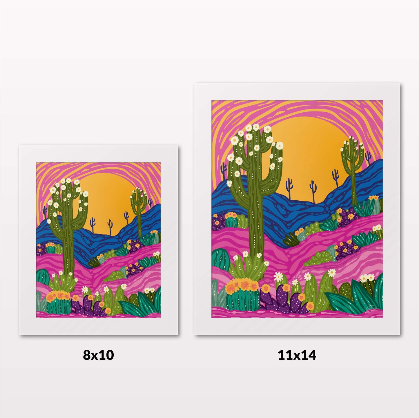 Comparing 8x10 and 11x14 framed art prints on a white wall