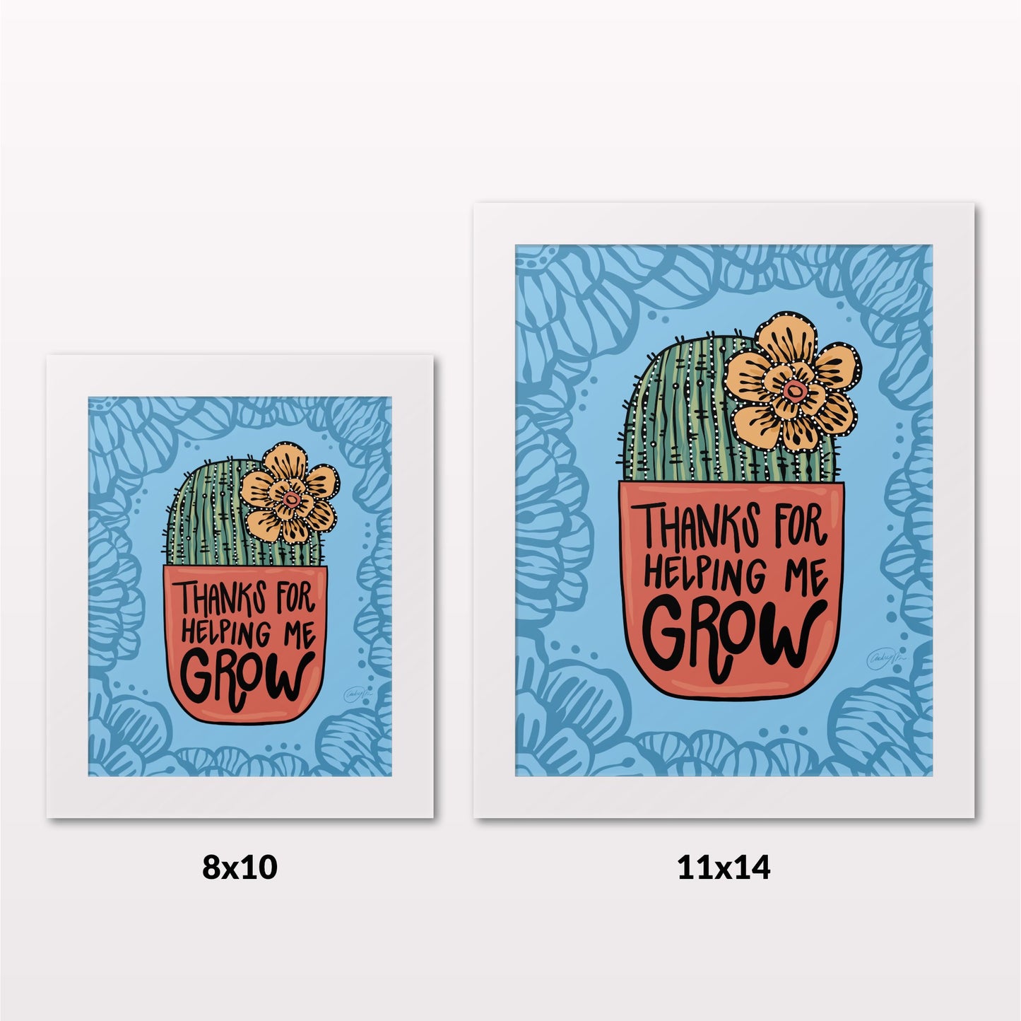 Comparing 8x10 and 11x14 framed art prints on a white wall