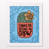 Art print in white frame on white wall