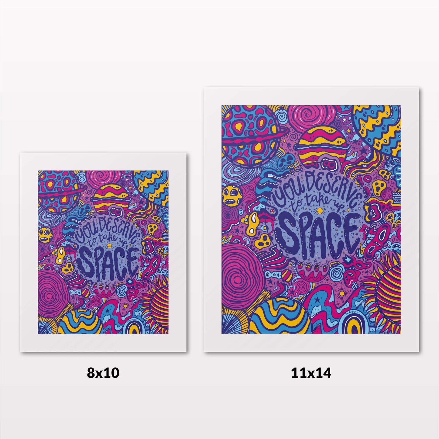 Comparing 8x10 and 11x14 framed art prints on a white wall