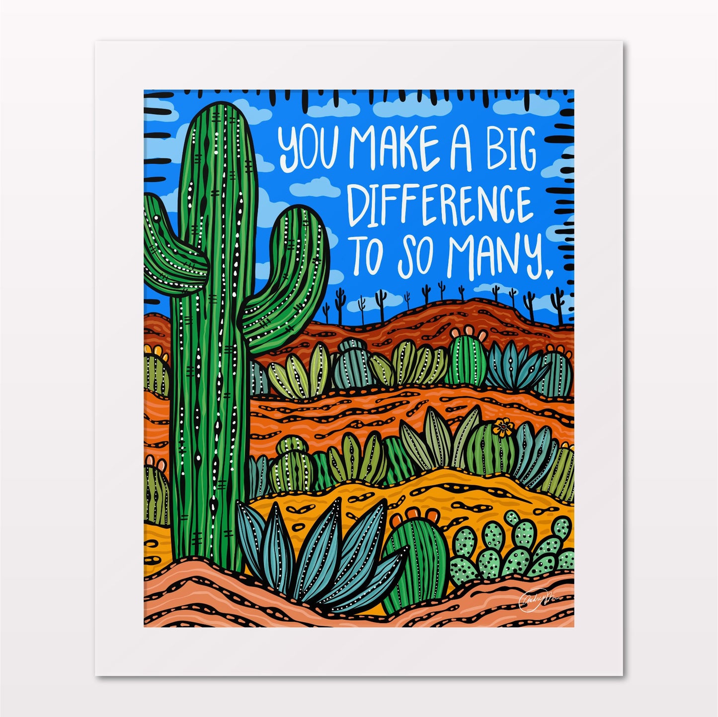 Art print in white frame on white wall