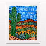Art print in white frame on white wall
